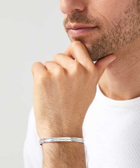 Sterling silver outer sound wave bracelet on male