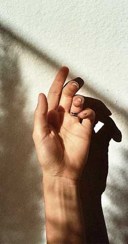 18 karat gold outer sound wave bracelet on female